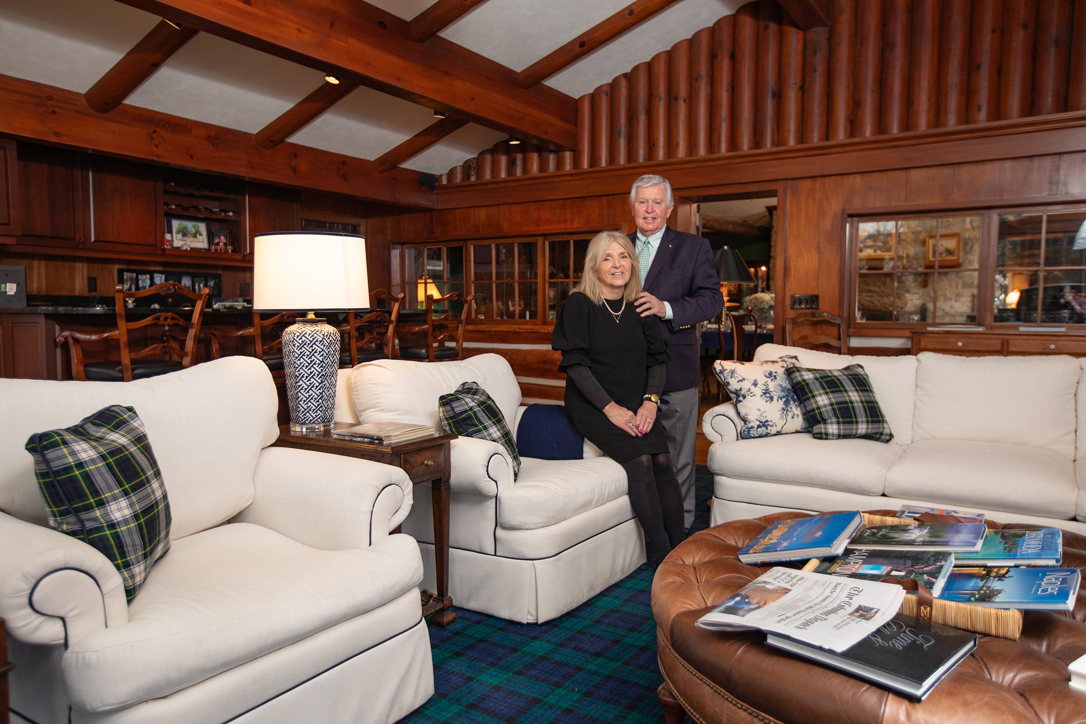 Donnette and Tom Calhoon in the River Room, a space they renovated in 2004 within their Norwich Township home